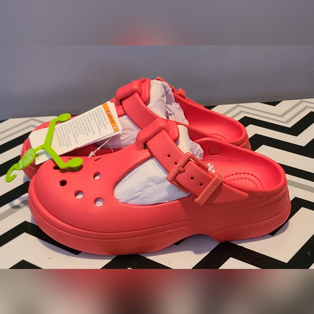 Crocs Classic Mary Jane Clogs in a pink color. 